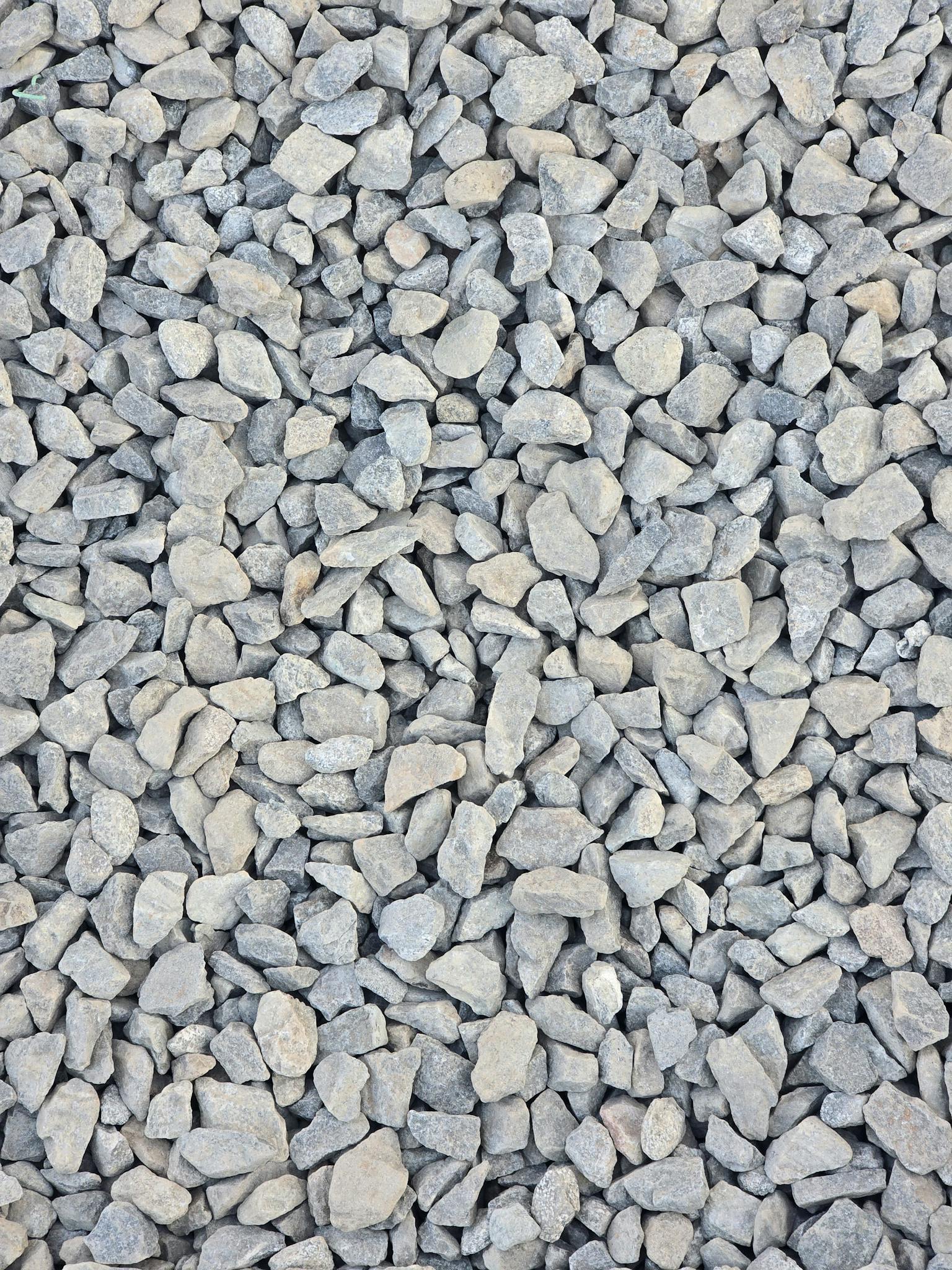 High-resolution image of gray gravel stones, ideal for textured backgrounds.